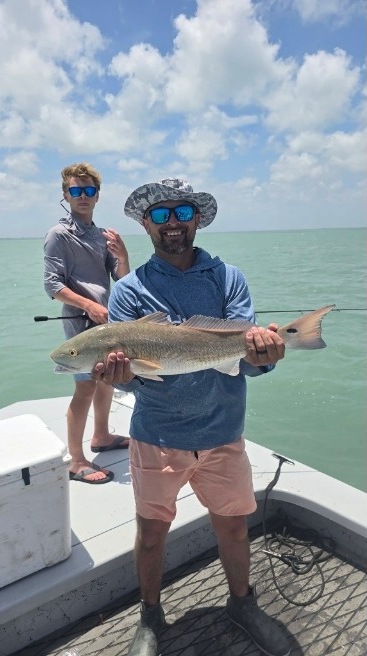 Client holding a nice redfish for the camera